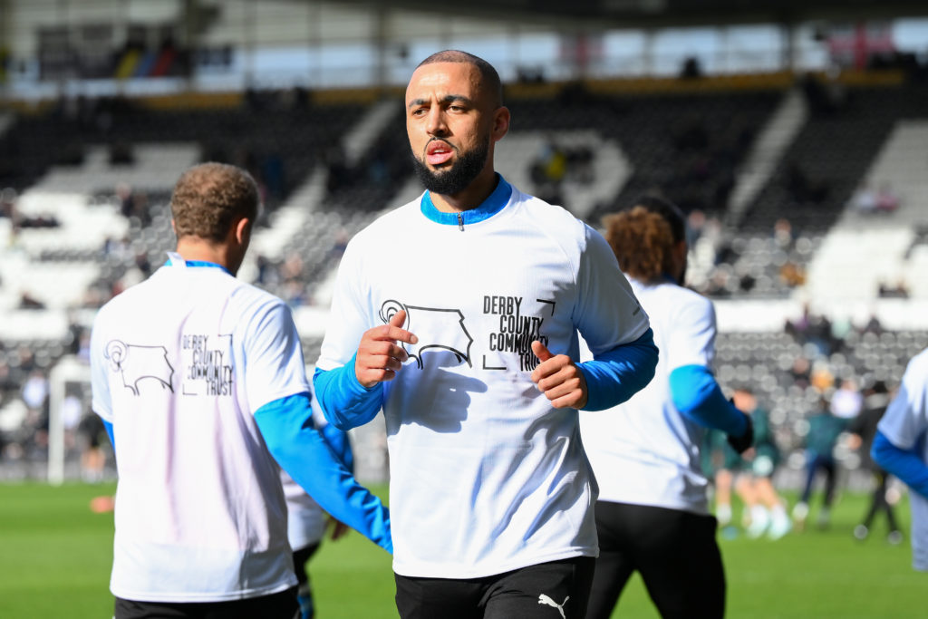 Kemar Roofe of Derby County warms up ahead of kick-off during the Sky Bet Championship match between Derby County and Millwall