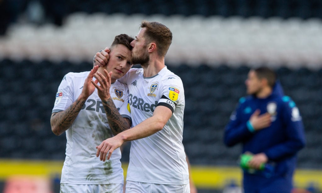 Liam Cooper (R) celebrates after Hull City vs Leeds United in the Sky Bet Championship
