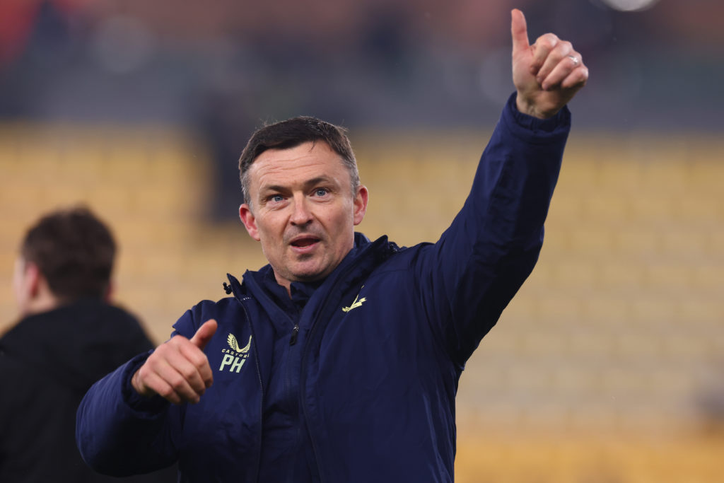 Preston North End manager Paul Heckingbottom acknowledges fans after a win