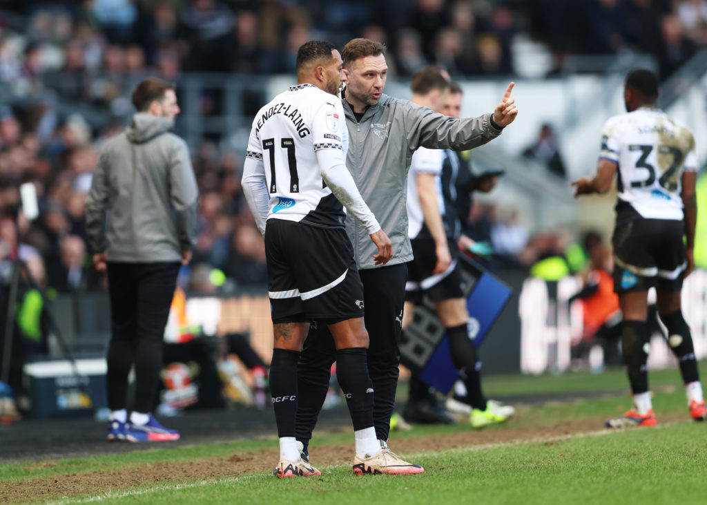 ohn Eustace, Manager of Derby County speaks with Nathaniel Mendez-Laing of Derby County during the Sky Bet Championship match between Derby County FC and Millwall FC