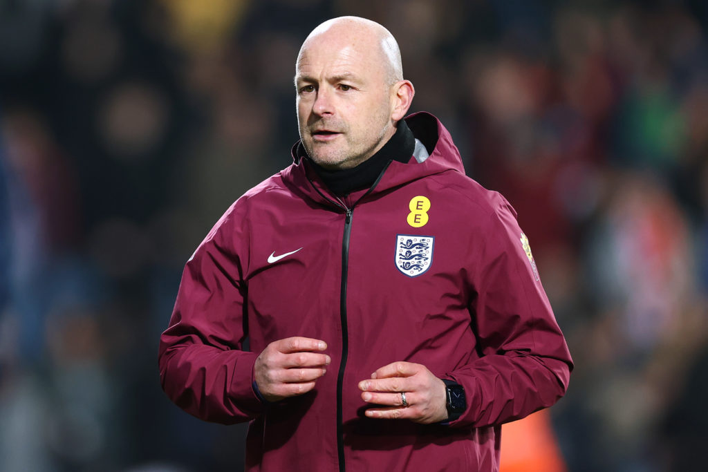 Lee Carsley, head coach of England, takes part in the pre-match warm-up before the Men's U21 international match between England and Portugal