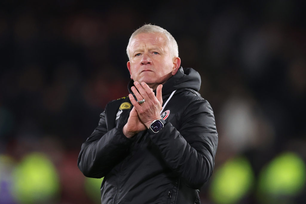 Chris Wilder, manager of Sheffield United, applauds the fans