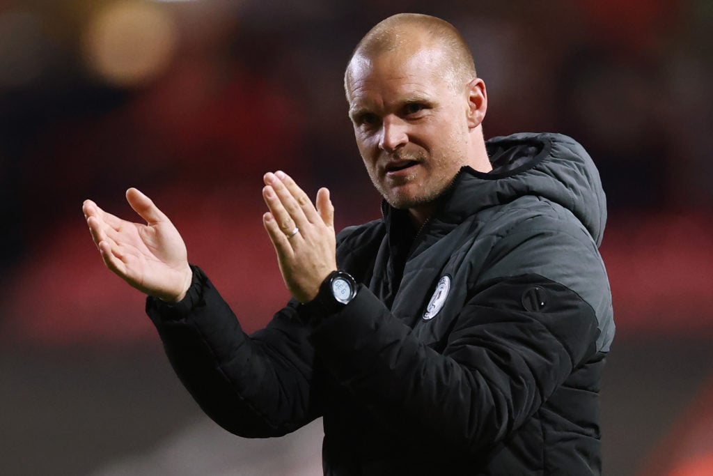 Liam Manning, manager of Bristol celebrates victory in front of the fans