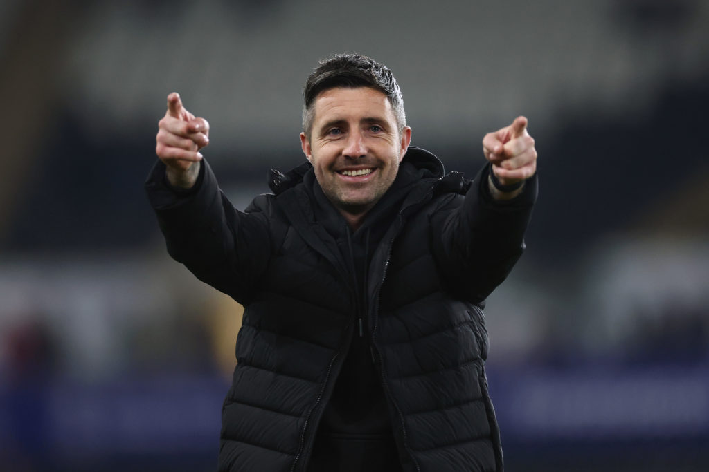 Alan Sheehan, manager of Swansea, celebrates with the fans after victory in the Sky Bet Championship match between Swansea City AFC and Plymouth Argyle FC