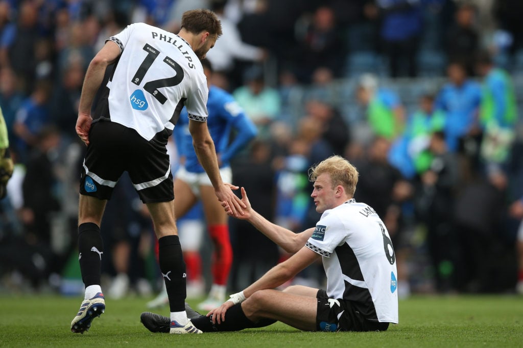 Nat Phillips and Sondre Langas of Derby County interact at the final whistle during the Sky Bet Championship match between Portsmouth FC and Derby County FC
