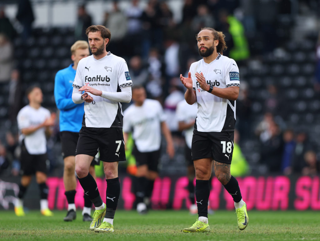 Tom Barkhuizen and Marcus Harness of Derby County acknowledge the fans after their 1-0 defeat to Luton Town in the Sky Bet Championship match between Derby County FC and Luton Town FC