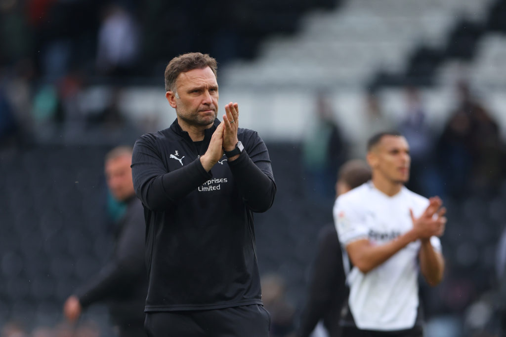 John Eustace, Manager of Derby County, acknowledges the fans after a 1-0 defeat to Luton Town