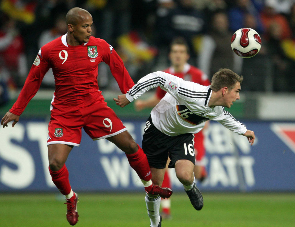 Germany's defender Philpp Lahm (R) vies