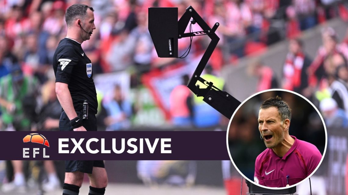 Referee Chris Kavanagh looks at the Video Assistant Referee screen prior to disallowing a goal scored by Harrison Burrows of Sheffield United (not ...
