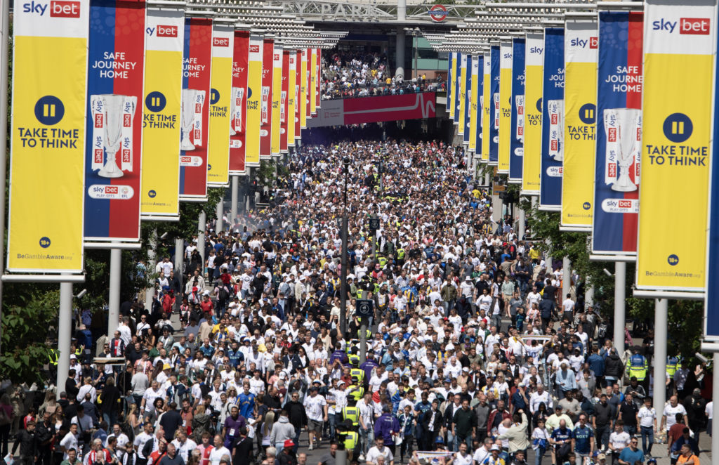 Leeds United and Southampton fans make their way inside Wembley Stadium for the 2024 play-off final