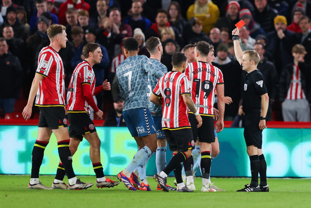 A red card is shown during Sheffield United and Sunderland in a Championship fixture