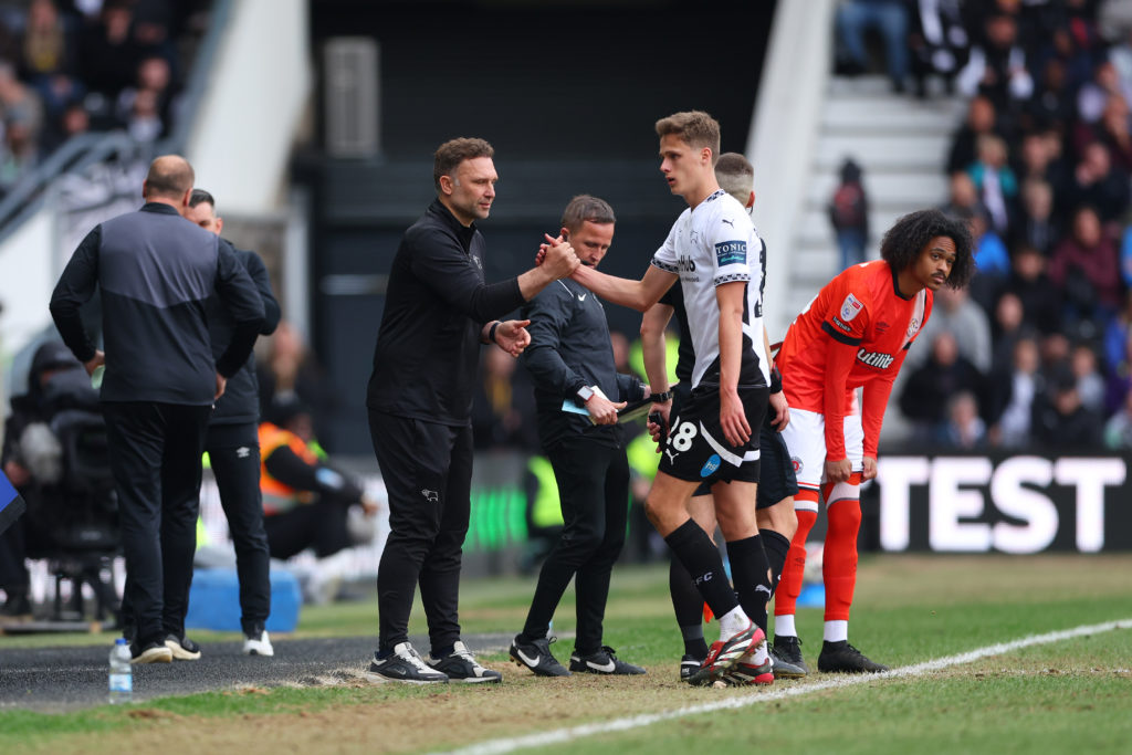 Harrison Armstrong of Derby County shakes hands with John Eustace, Manager of Derby County, as he is substituted off during the Sky Bet Championship match between Derby County FC and Luton Town FC