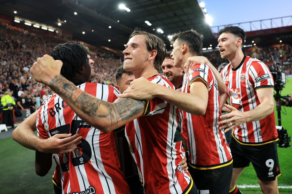 Sheffield United's players celebrate after scoring against Bristol City in the play-offs