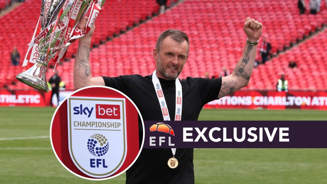 Nathan Jones, Head Coach of Charlton Athletic, celebrates with the League One Play-off Final Trophy after his team's victory in the Sky Bet League ...
