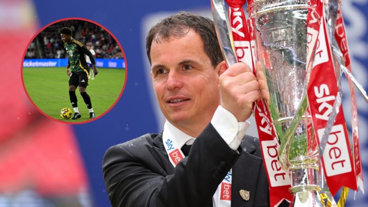 Main image, Regis Le Bris the head coach / manager of Sunderland poses with the trophy as he celebrates promotion to the Premier League during the ...