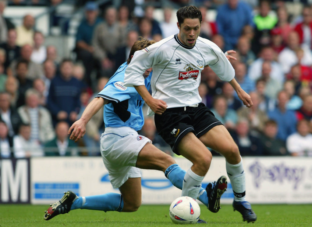 Malcolm Christie of Derby County and John Mackie of Reading in action during the Nationwide First Division game between Derby County and Reading F.C.