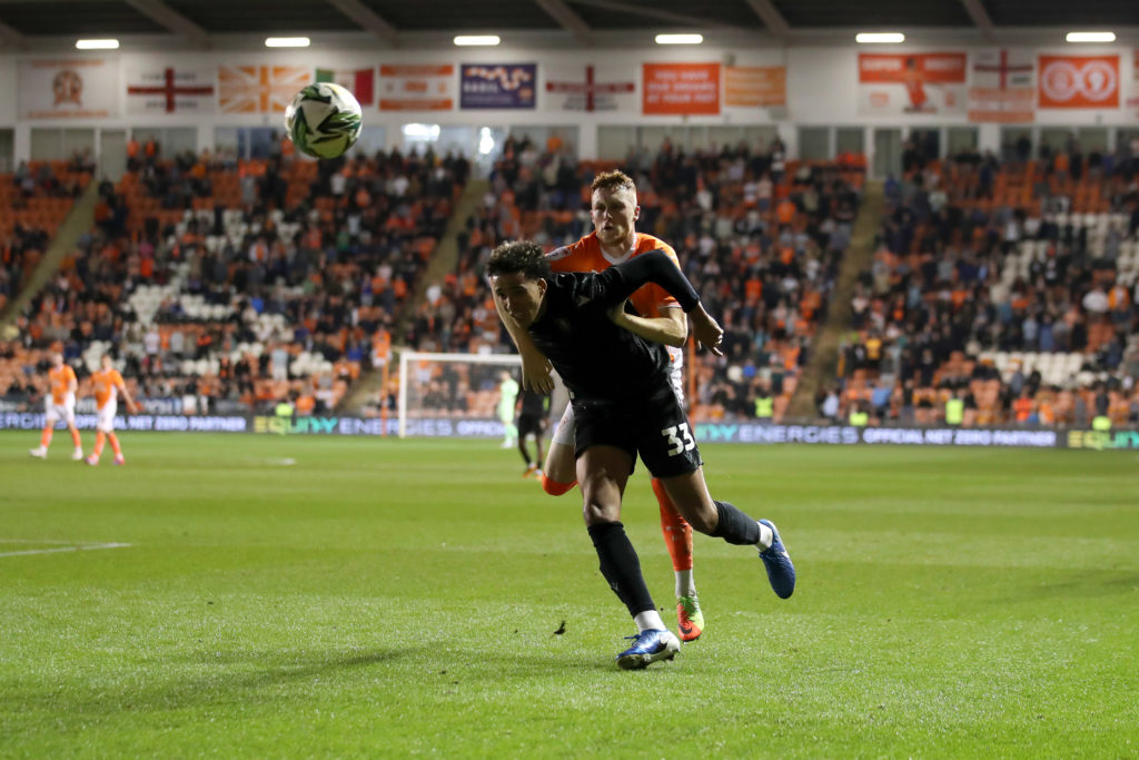 Gabriel Otegbayo shrugs off a challenge from a Blackpool defender during Sheffield Wednesday's Championship fixture at Bloomfield Road
