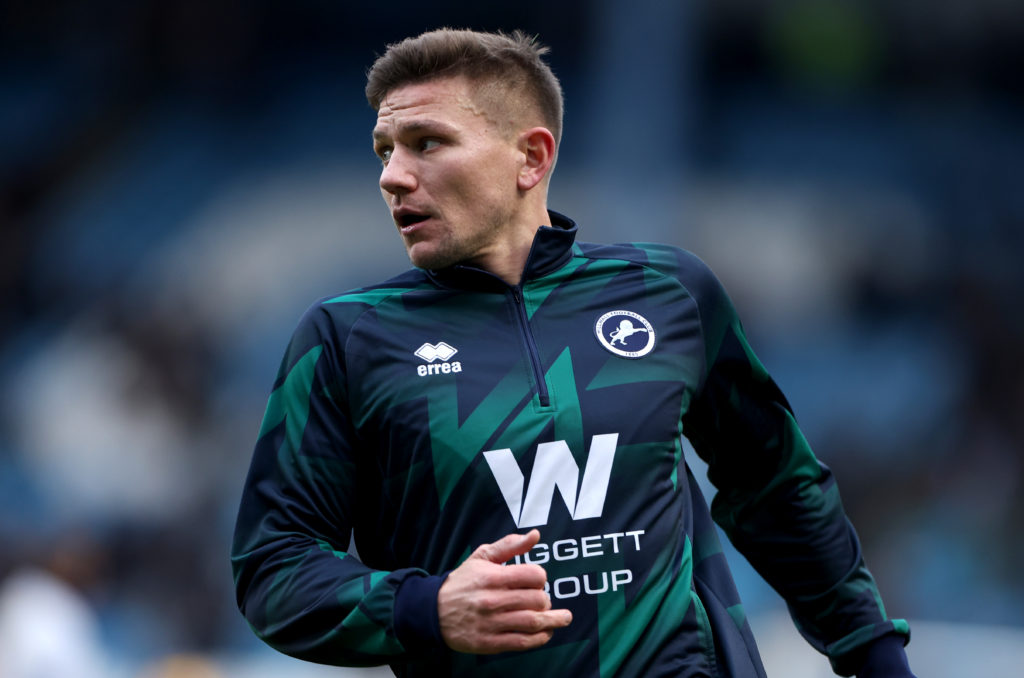 Former Millwall captain Shaun Hutchinson warms up ahead of a Championship game against Sheffield Wednesday in the 2024/25 season