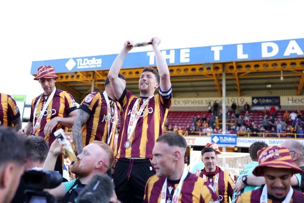 Bradford City players celebrate promotion after game v Fleetwood Town - Sky Bet League Two