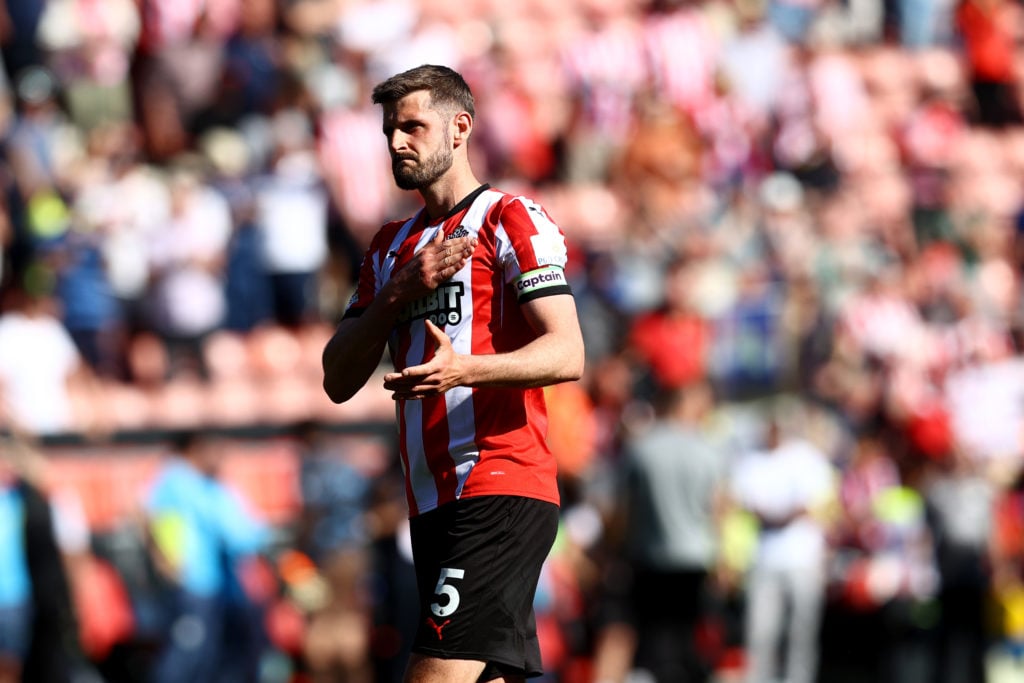 Southampton's Jack Stephens taps the club badge in the Premier League fixture between Southampton and Manchester City.