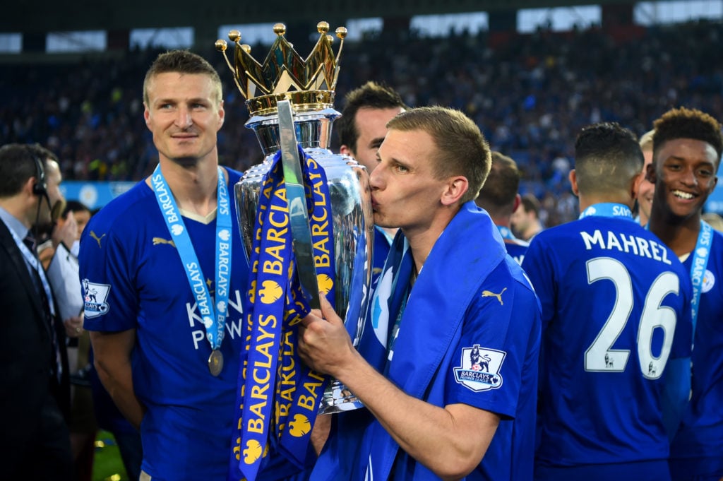 Marc Albrighton kisses the Premier League trophy as a Leicester City player in 2016