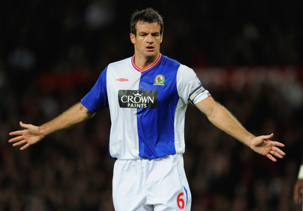 Ryan Nelsen leading Blackburn Rovers in a Premier League fixture against Manchester United.