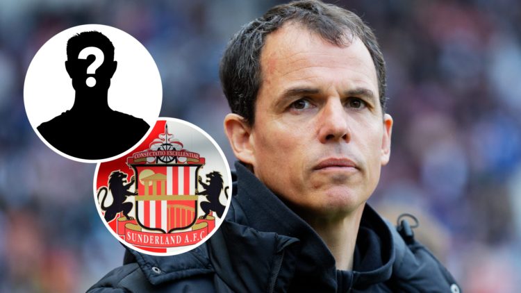 Sunderland manager Regis Le Bris watches on from the touchline in the 24/25 Championship, with Sunderland AFC badge and mystery player