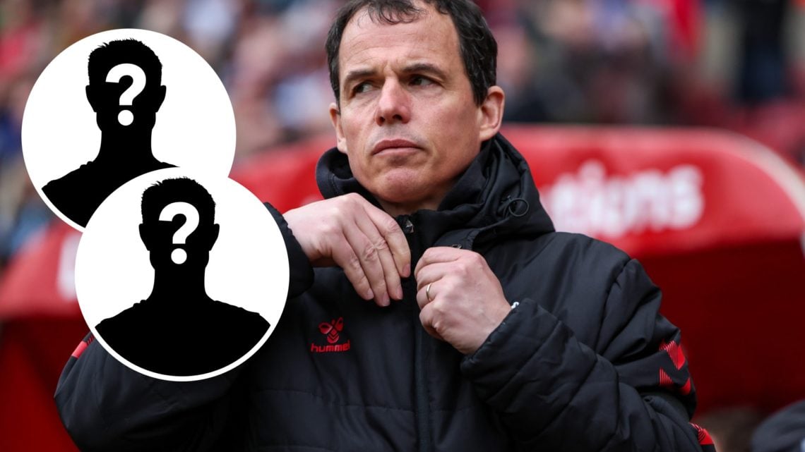 Sunderland head coach Regis Le Bris watches Championship football on from the Stadium of Light touchline, and two mystery Sunderland players