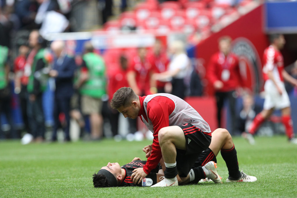 Sunderland's Lynden Gooch consoles Luke O'Nien