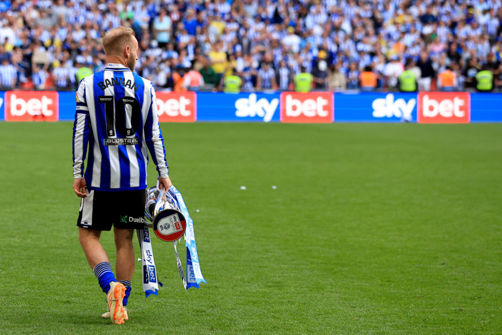Barry Bannan of Sheffield Wednesday celebrates with the trophy