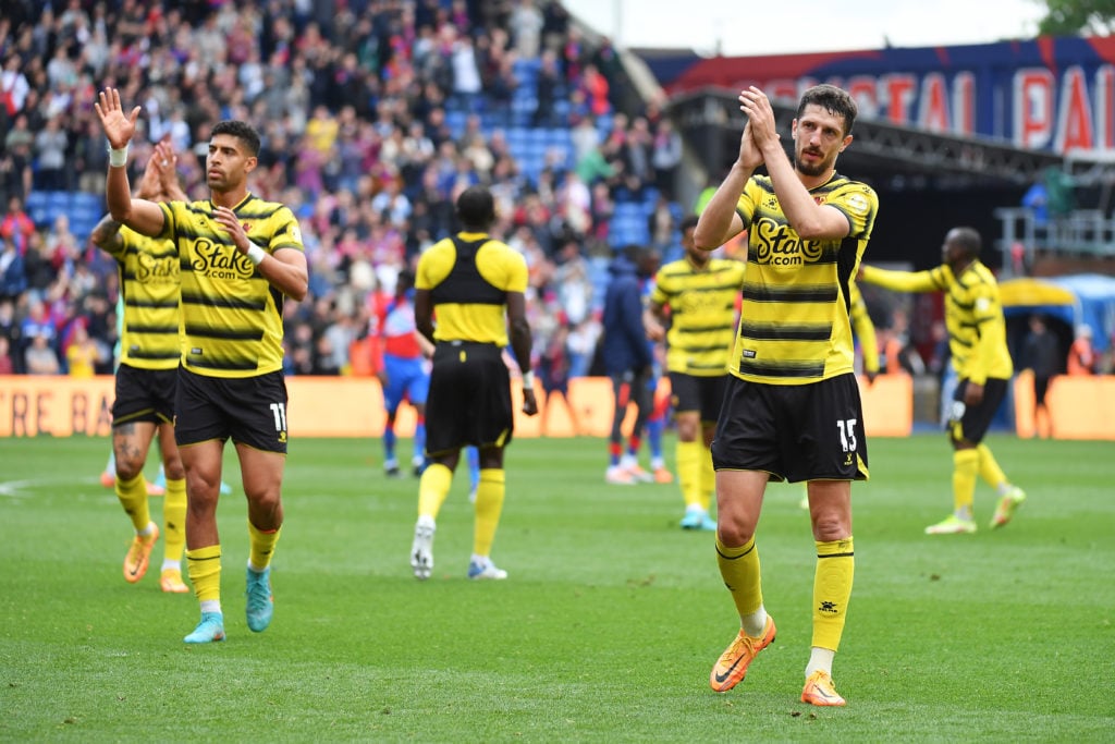 Craig Cathcart of Watford FC applauds the fans after their sides defeat and relegation to the Championship during the Premier League match between Crystal Palace and Watford