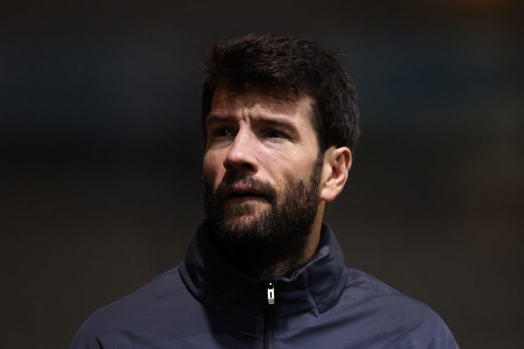 Brian Barry-Murphy, Head Coach of Manchester City U21 looks on