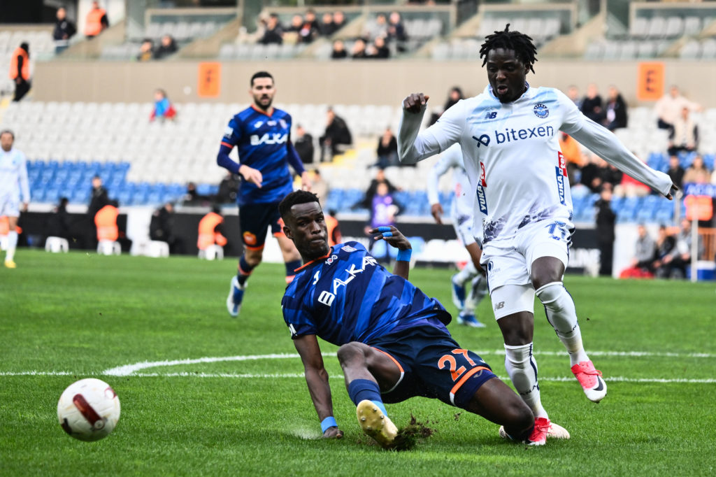 Ousseynou Ba (L) of RAMS Basaksehir in action against Babajide David Akintola (11) of Yukatel Adana Demirspor