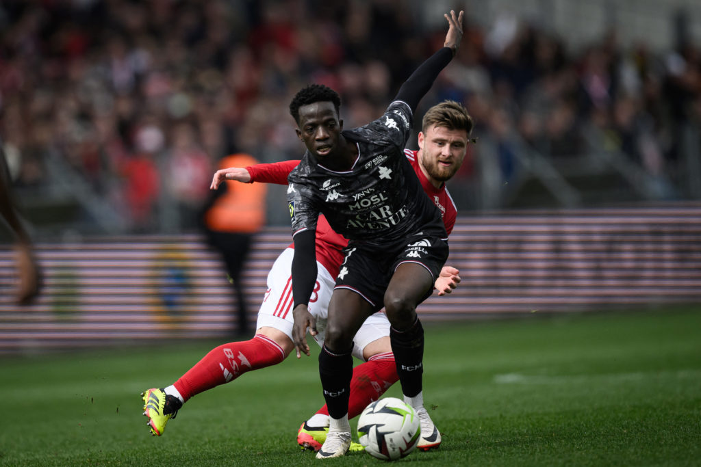 Metz's Senegalese forward #07 Papa Amadou Diallo fights for the ball with Brest's French midfielder #08 Hugo Magnetti during the French L1 football match between Stade Brestois 29 (Brest) and FC Metz