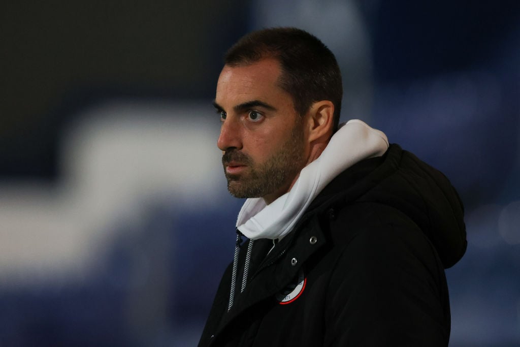 Ruben Selles watches on with a concerned look during Stockport County vs Reading
