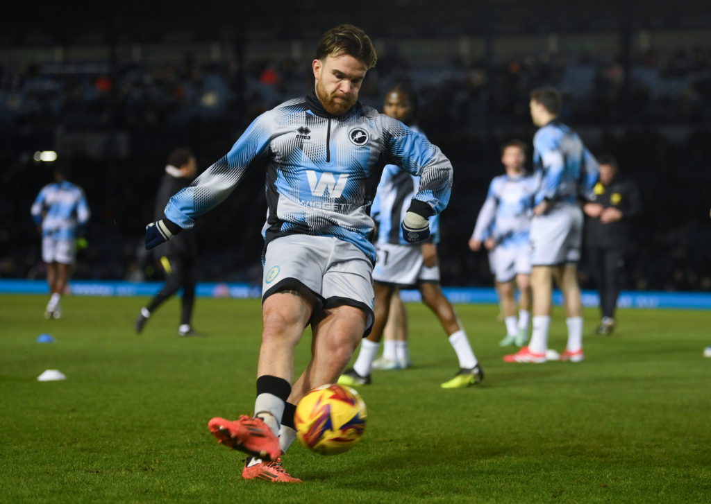 Aaron Connolly of Millwall warms up prior to the Sky Bet Championship match between Portsmouth FC and Millwall FC