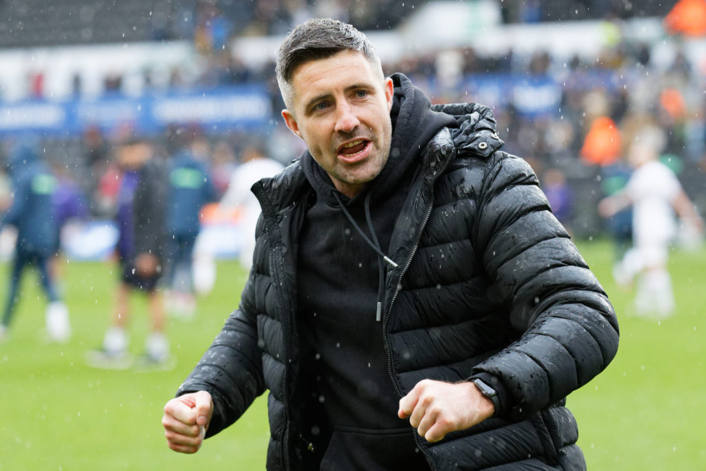 Swansea City manager Alan Sheehan celebrates in front of home supporters after during the Sky Bet Championship match between Swansea City and Hull City at the Swansea.com Stadium