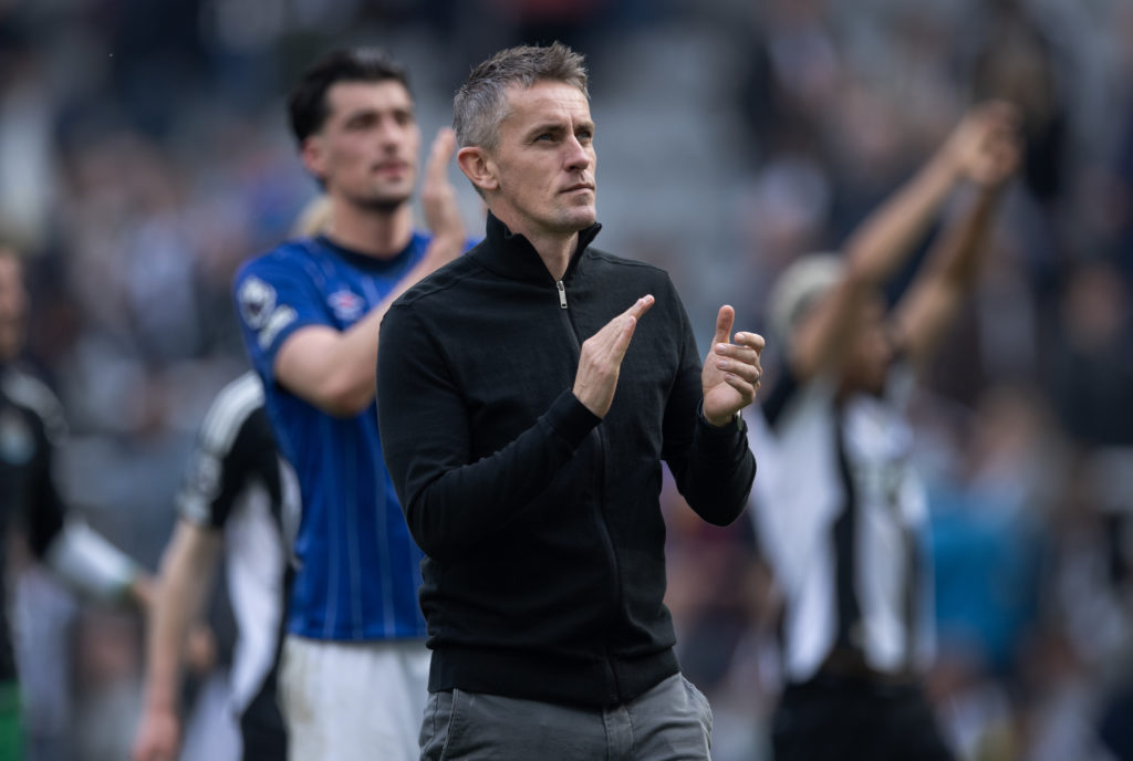 Ipswich Town manager Kieran McKenna acknowledges the fans after the Premier League match between Newcastle United FC and Ipswich Town FC