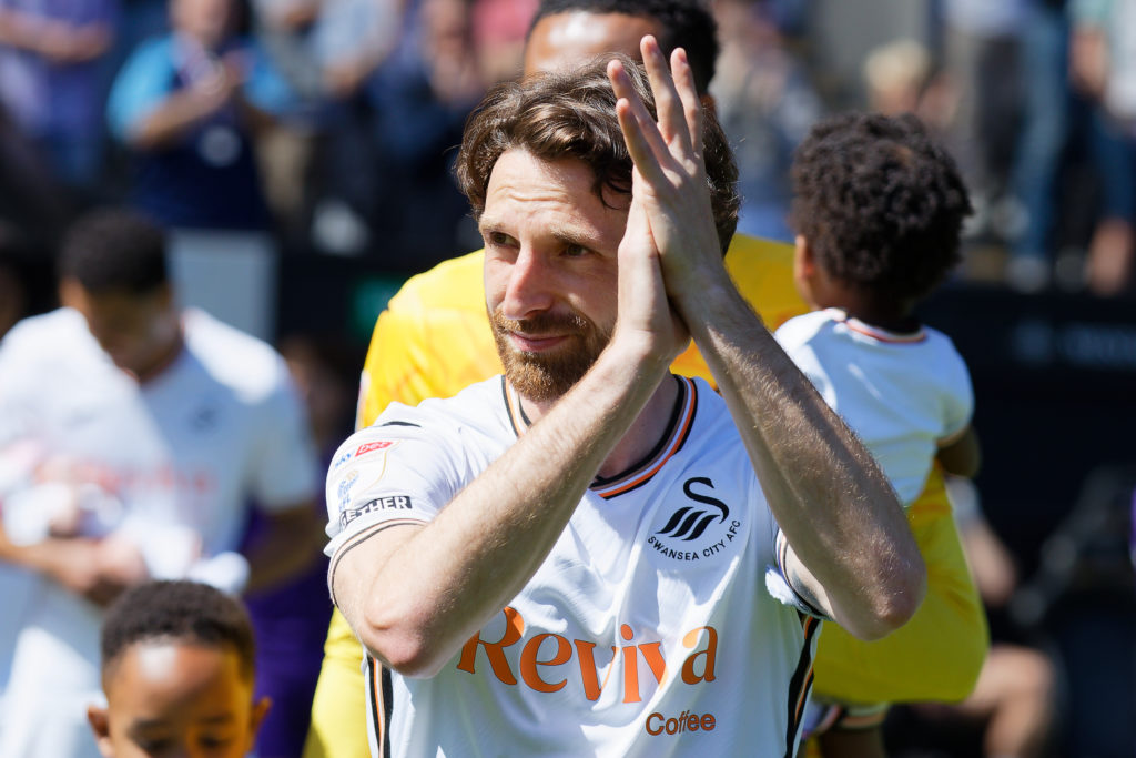 Joe Allen playing for Swansea City against Oxford United as he retires.