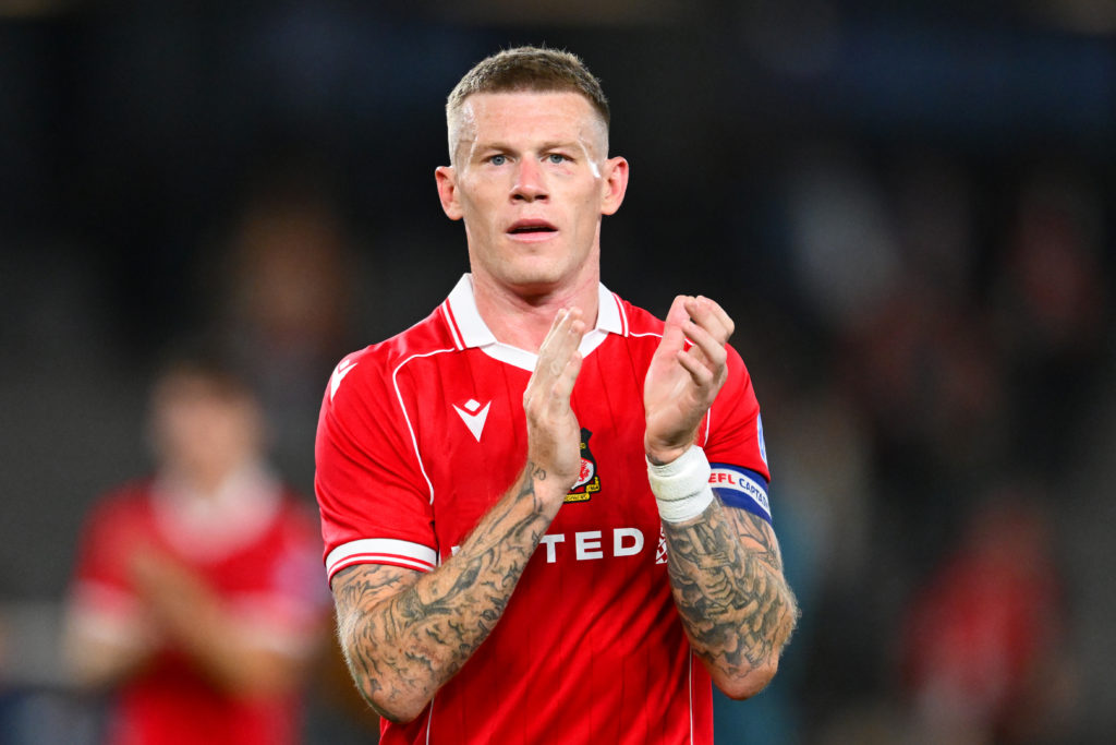 James McClean of Wrexham AFC applauds after the team's victory in the match between Melbourne Victory and Wrexham AFC.