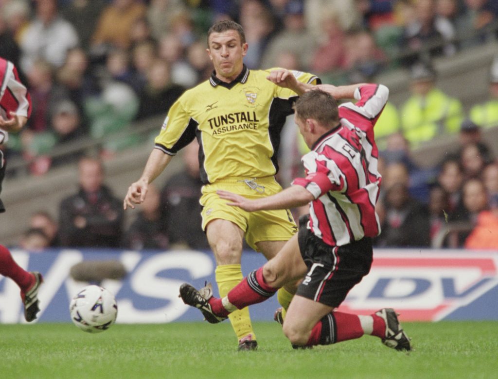 David Brammer, for Port Vale trying to get past Paul Evans of Brentford