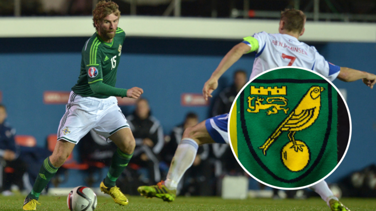 Paddy McCourt (L) of Northern Ireland competes Frodi Benjaminsen of Faroe Islands (R) during the Euro 2016 Qualifier between Northern Ireland and F...