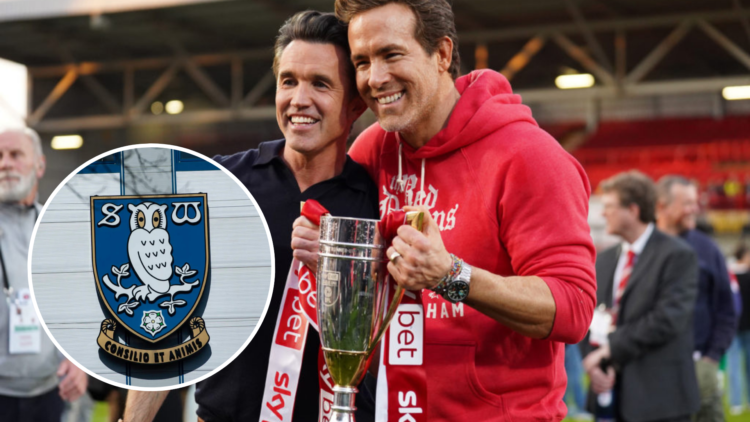 Rob McElhenney and Ryan Reynolds, co-owners of Wrexham AFC, pose for a photo with the trophy following the club's promotion to the Sky Bet Champion...