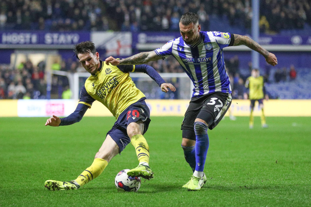 Bolton Wanderers' Kieran Lee battles with Sheffield Wednesday's Jack Hunt during the Sky Bet League One between Sheffield Wednesday and Bolton Wanderers