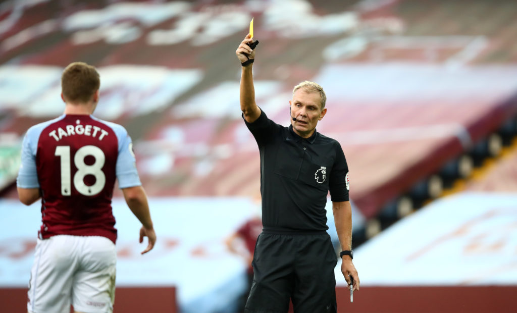 Matt Targett receives a yellow card in Aston Villa's 1-0 win over Sheffield United