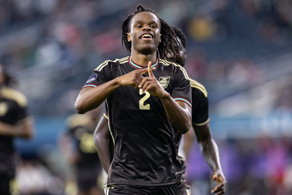 Dexter Lembikisa celebrates after scoring for Jamaica against Panama
