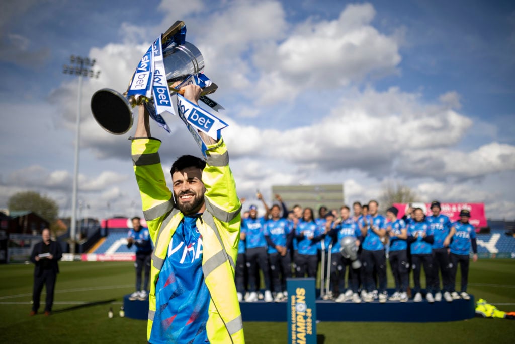 Stockport County celebrating their promotion and League Two title