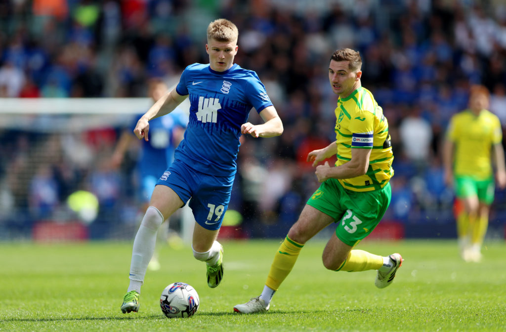 Jordan James of Birmingham City runs with the ball whilst under pressure from Kenny McLean of Norwich City during the Sky Bet Championship match between Birmingham City and Norwich City