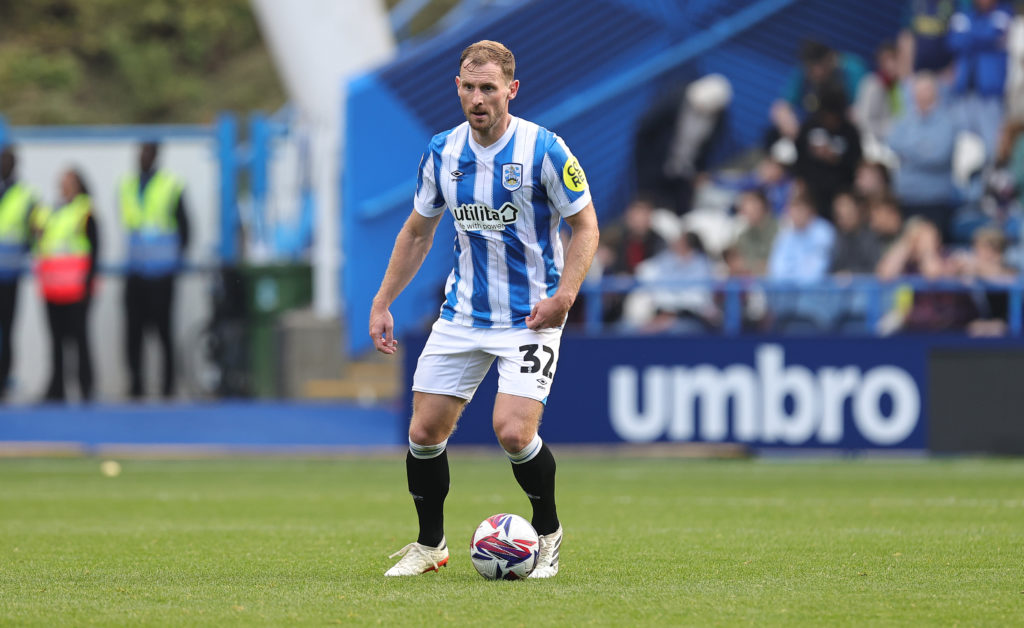 Tom Lees in action for Huddersfield Town AFC against Northampton Town FC in Sky Bet League One game