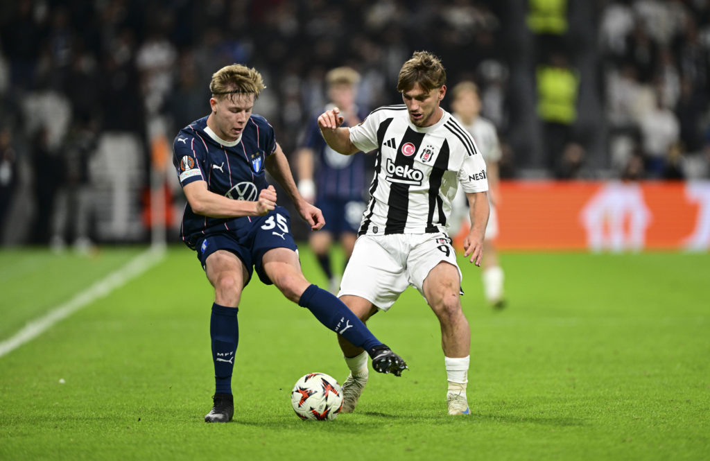 Nils Zätterström of Malmo battles for the ball against Besiktas defender in the UEFA Europa League